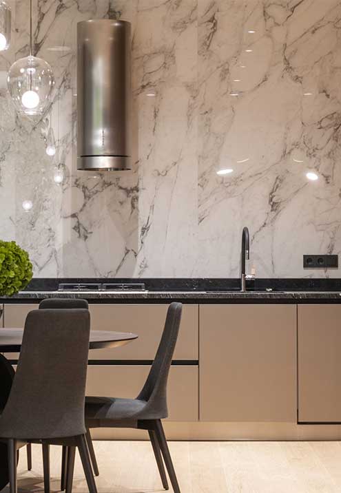 Custom kitchen with stone countertops by Mayan Stonecrafters
